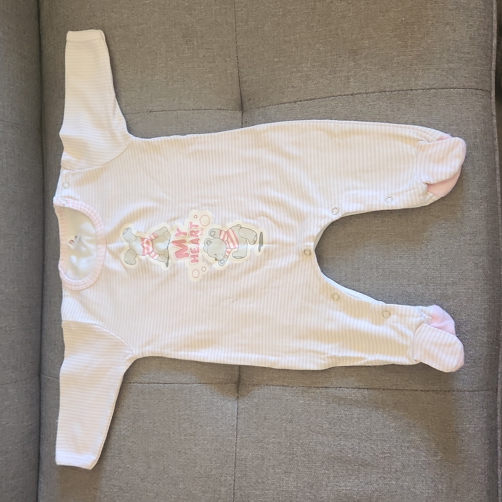 One Piece footed soft pink bodysuit
